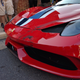 Illustration for article titled Ferrari 458 Speciale Mutilated In Front Of Children At Cars & Coffee